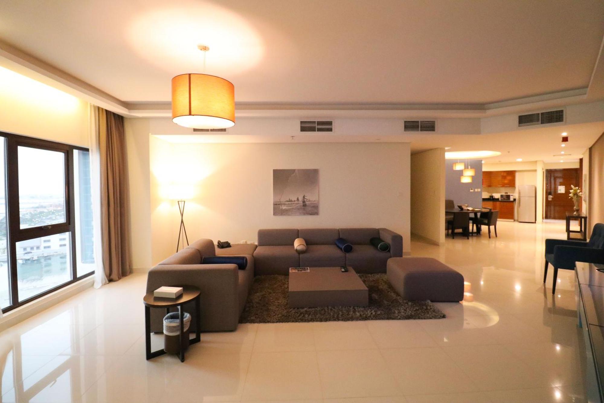 Lagoona Beach Luxury Resort And Spa Manáma Kültér fotó A living room in a typical apartment